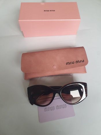 Lunettes de Soleil Miu Miu – Modèle SMU 03Ws