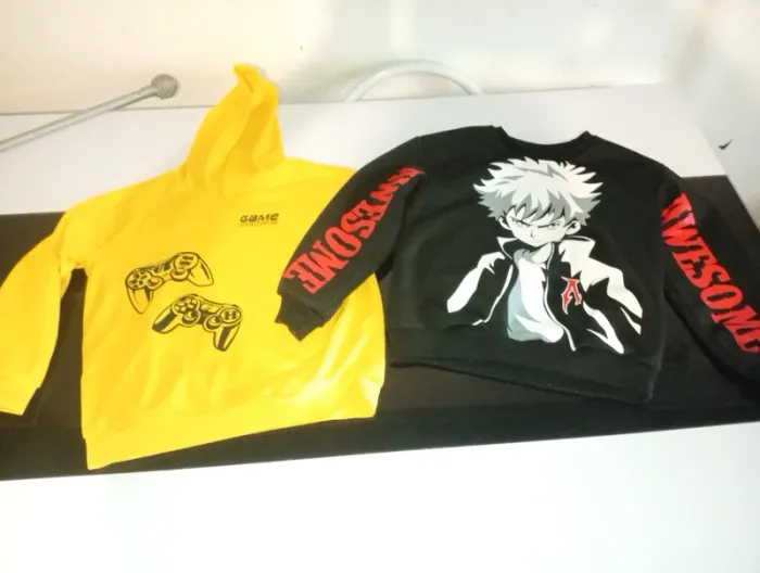 Lot de 2 sweats 7.8 ans