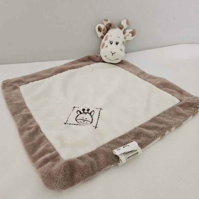 Doudou girafe action