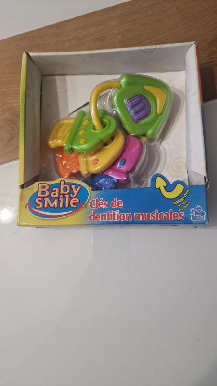 Clés de dentition musicales Baby smile neuves