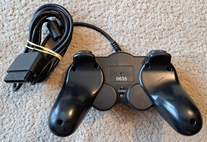 🎮 Manette générique noire Sony PlayStation 2 PS2 - photo numéro 2