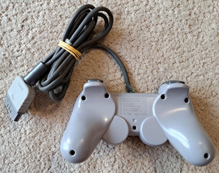 🎮 Manette officielle DualShock grise Sony PlayStation 1 PS1 - photo numéro 2