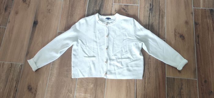 Gilet blanc un peu tâché