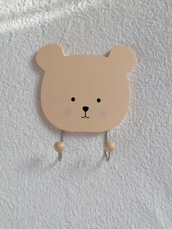 Crochet porte vêtements bébé