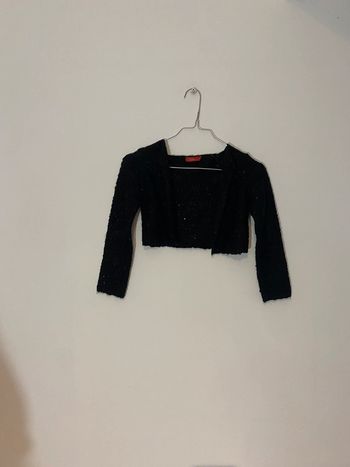 Gilet noir à paillettes taille 6ans