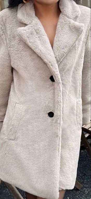 Manteau en fausse fourrure neuf