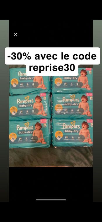 Six paquets de couches Pampers taille 4