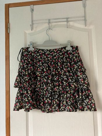 Jupe à froufrous noire à pois verts et bordeaux