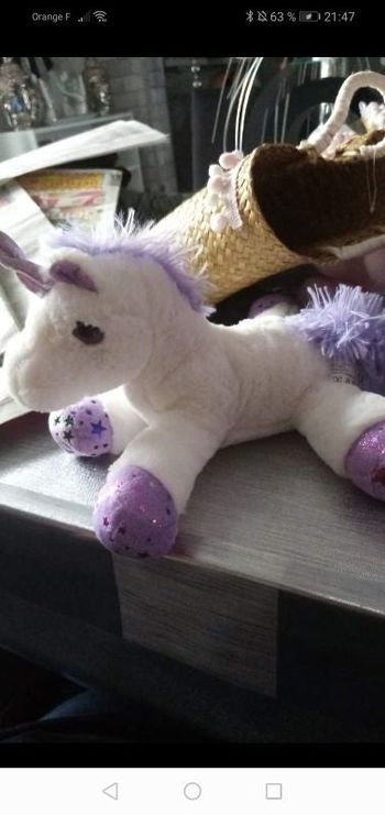 Peluche licorne violet