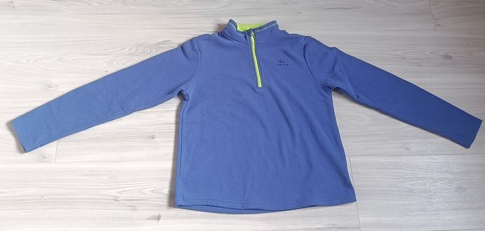 Sweat molletonné et zippé de couleur bleu clair. Taille 12 ans - photo numéro 2