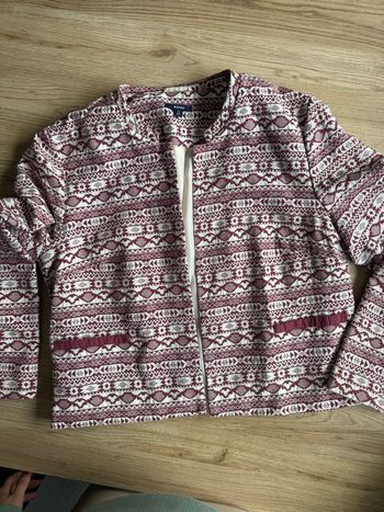 Veste rouge est blanc neuf taille 46