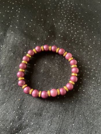 Bracelet perles violettes dorées