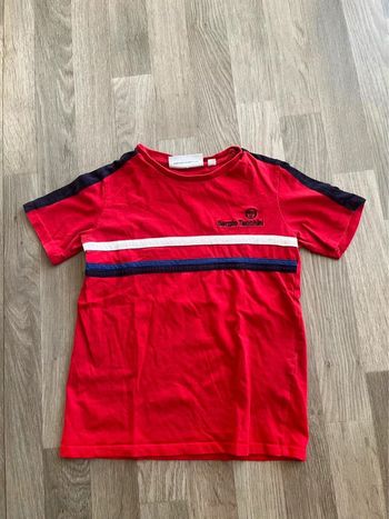 Très beau tee shirt blouse  Sergio tacchini taille 10 ans