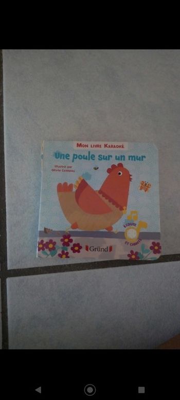 Mon livre karaoké et musical Une poule sur un mur