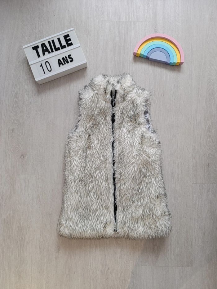 Veste sans manches avec poils taille 10ans
