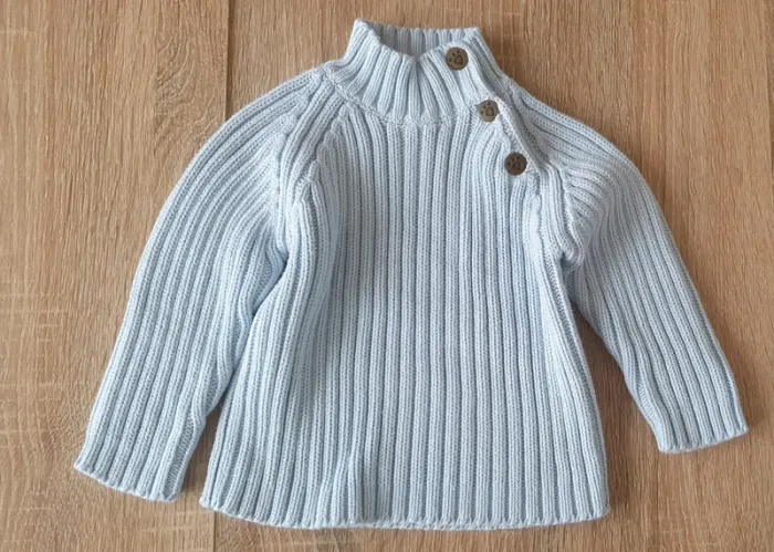 Pull col montant
