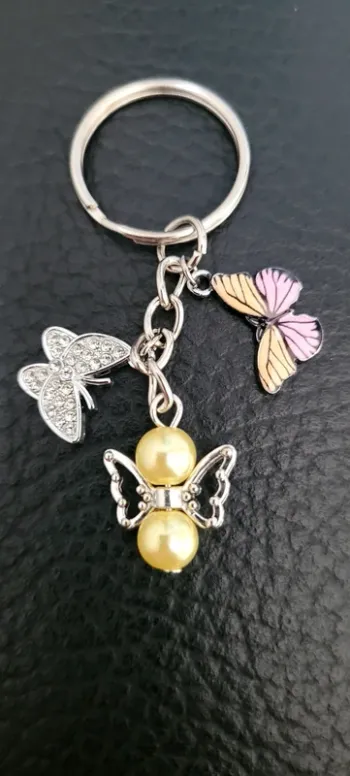 Porte-clés ange gardien papillons