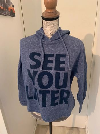 Sweat-shirt à capuche en bon état