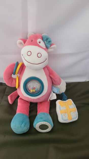 Peluche d'éveil Lola vache NOUKIE'S Lola anniversaire rose activités grelot pouet