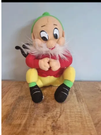 Peluche blanche neige et les 7 nains joyeux.
25 cm