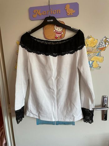 Pull blanc et noir, taille 36.