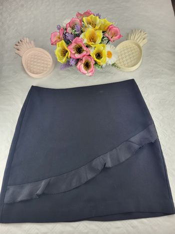 Jupe courte noire etam avec volant satiné taille 36