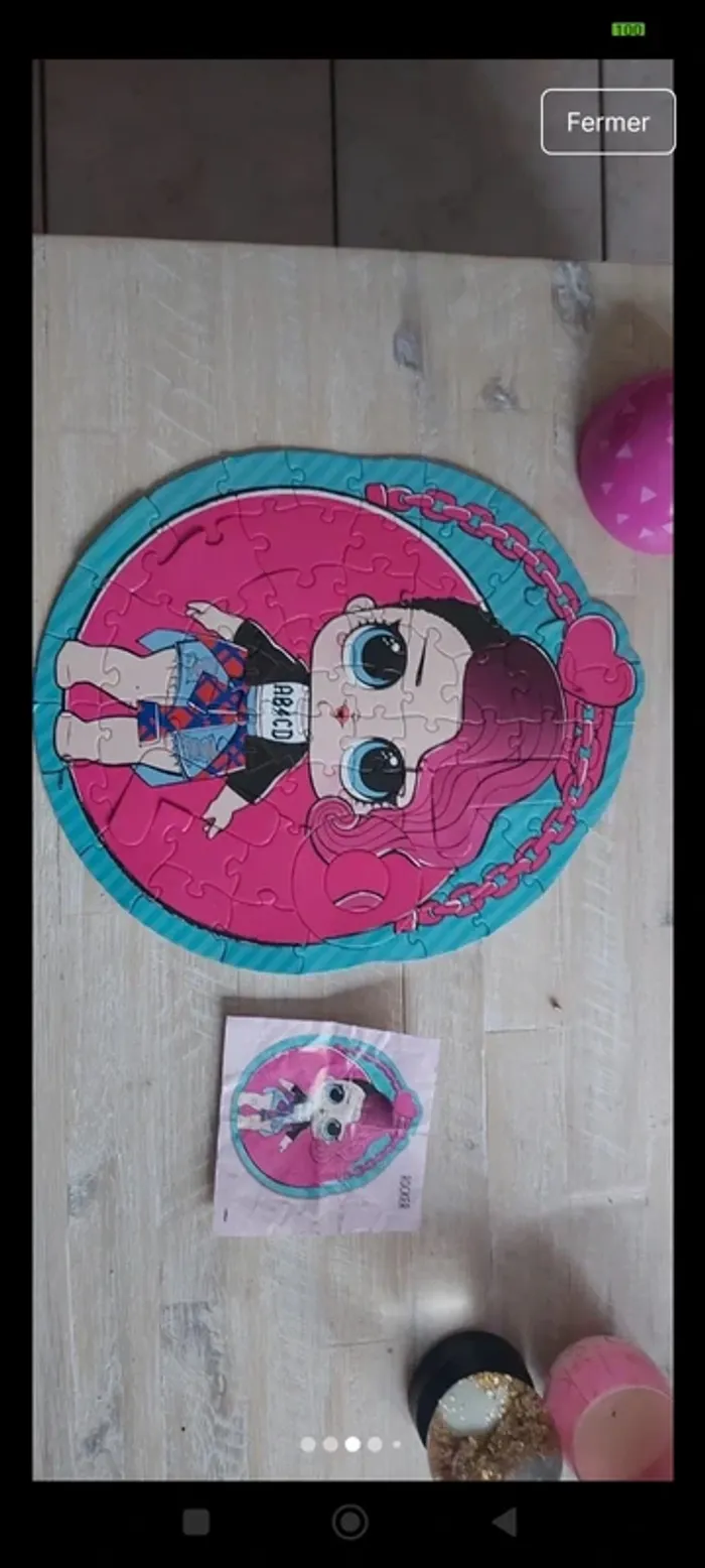 Puzzle LOL complet avec sa boîte de rangement en forme de boule - photo numéro 6