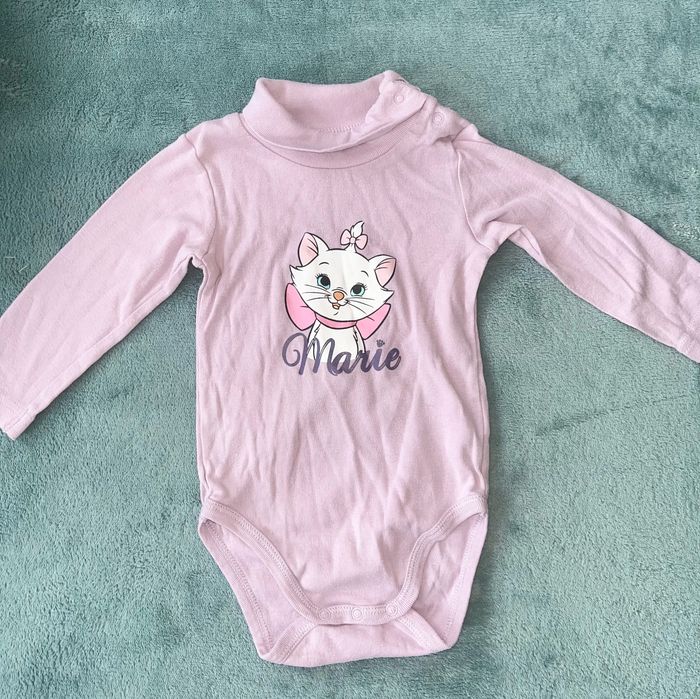 Body haut taille 9 mois en bonne état