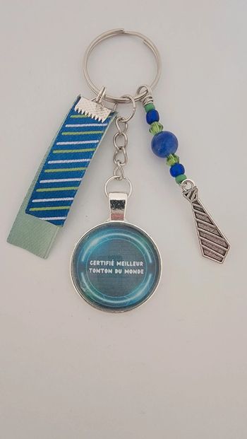 Cadeau tonton, porte clé message bijoux de sac " meilleur tonton du monde "