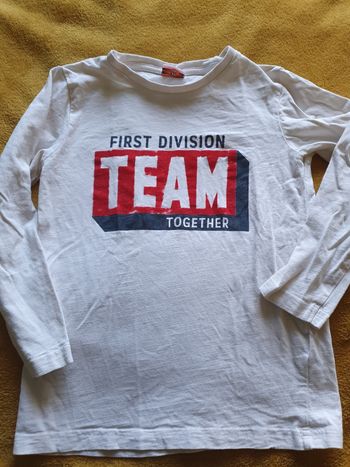 Tshirt 8 ans tape à l'oeil