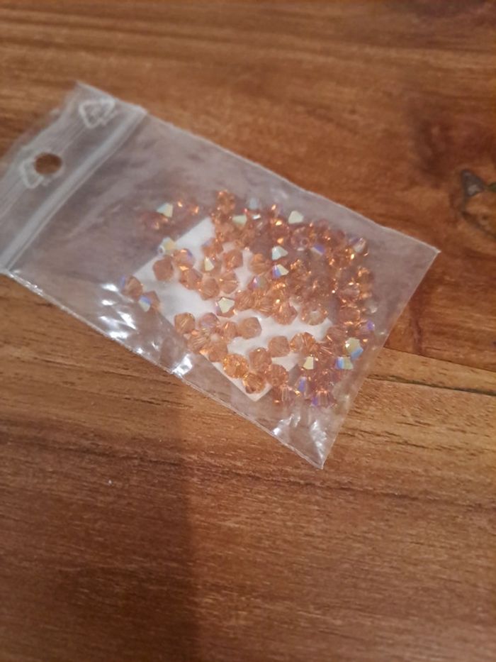Perles marron ambre reflets