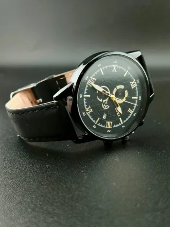 Montre noire/dark légère dorée hommes