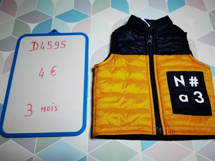 D4595 - doudoune sans manche garçon 3 mois