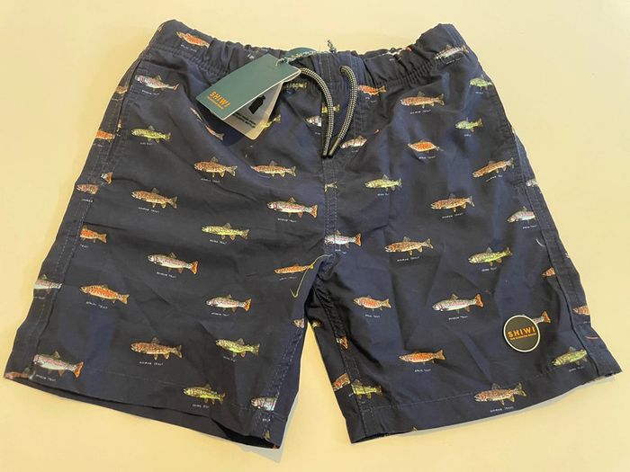 Short de bain neuf taille 12 ans shiwi