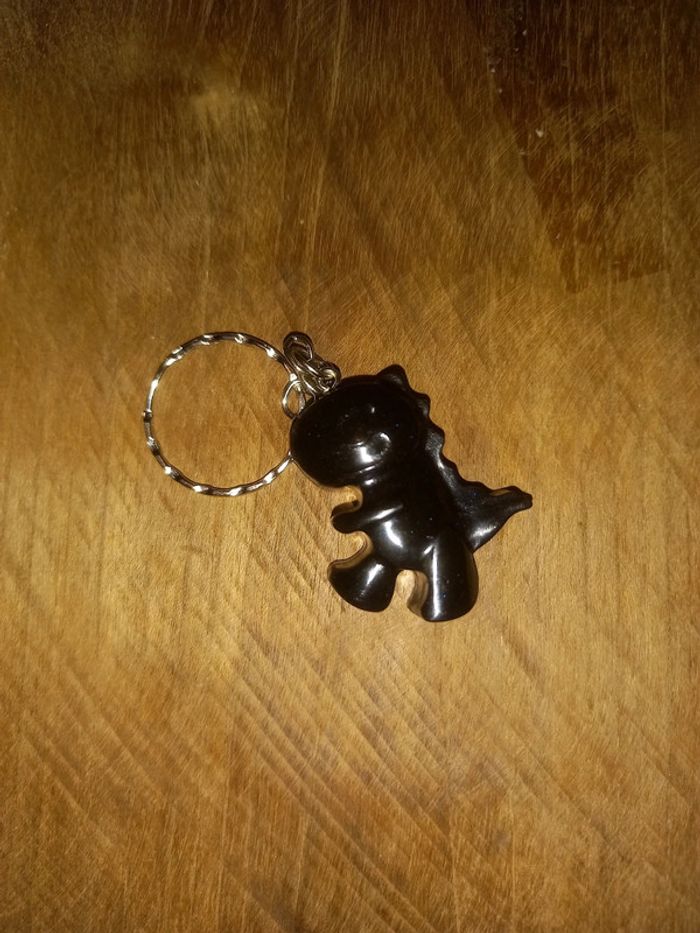 Porte clé dino noir