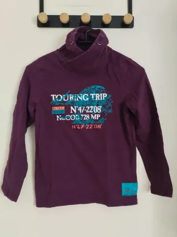 Jolie polo manches longues taille 10 ans