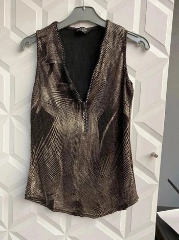 Top noir et dorée taille unique