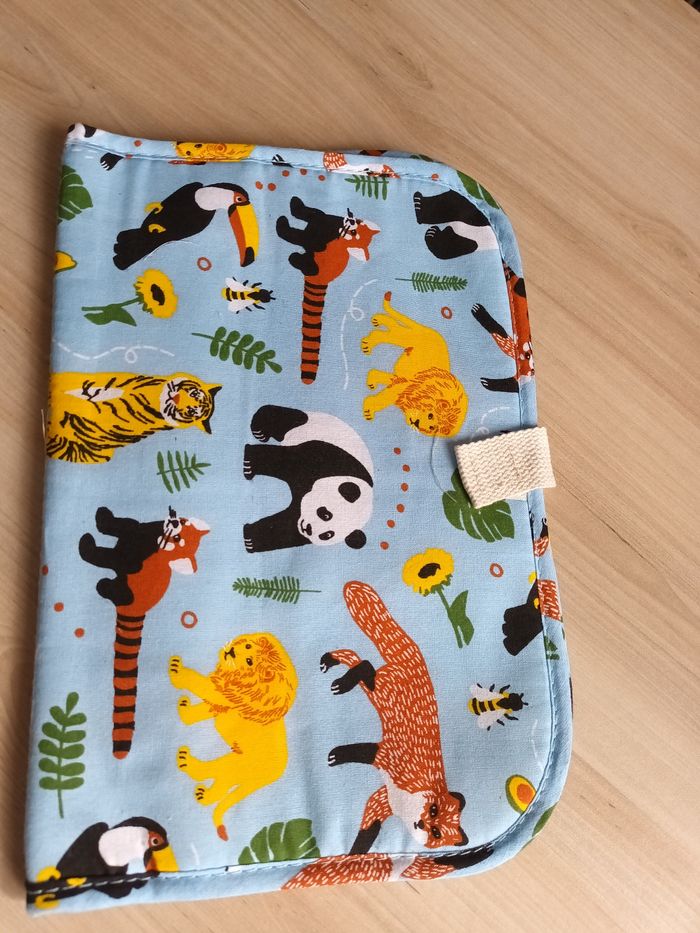 Petit tapis à langer pliable