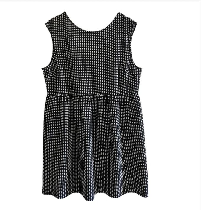 Robe noire à pois blancs sans manche - Geena
Taille XXL - photo numéro 2