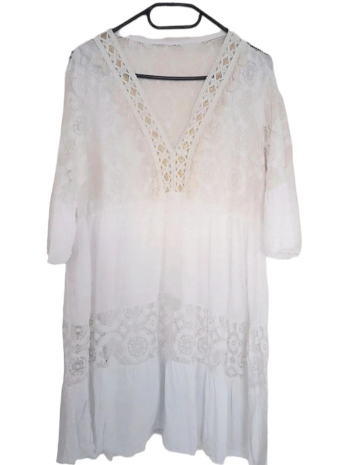 Magnifique tunique blanche et doré