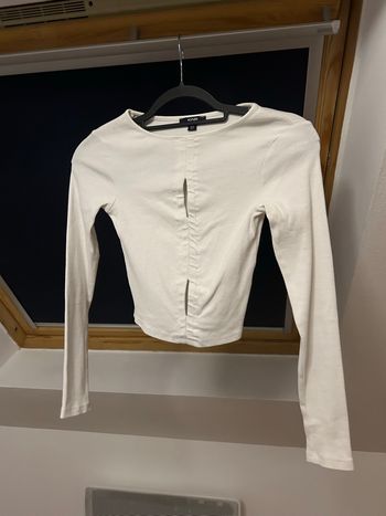 Petit pull / top blanc à décolleté – Kiabi – XS