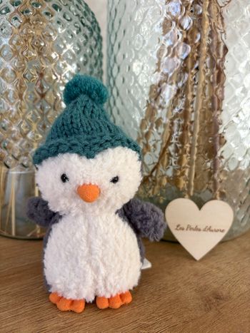 Peluche pingouin bonnet bleu 