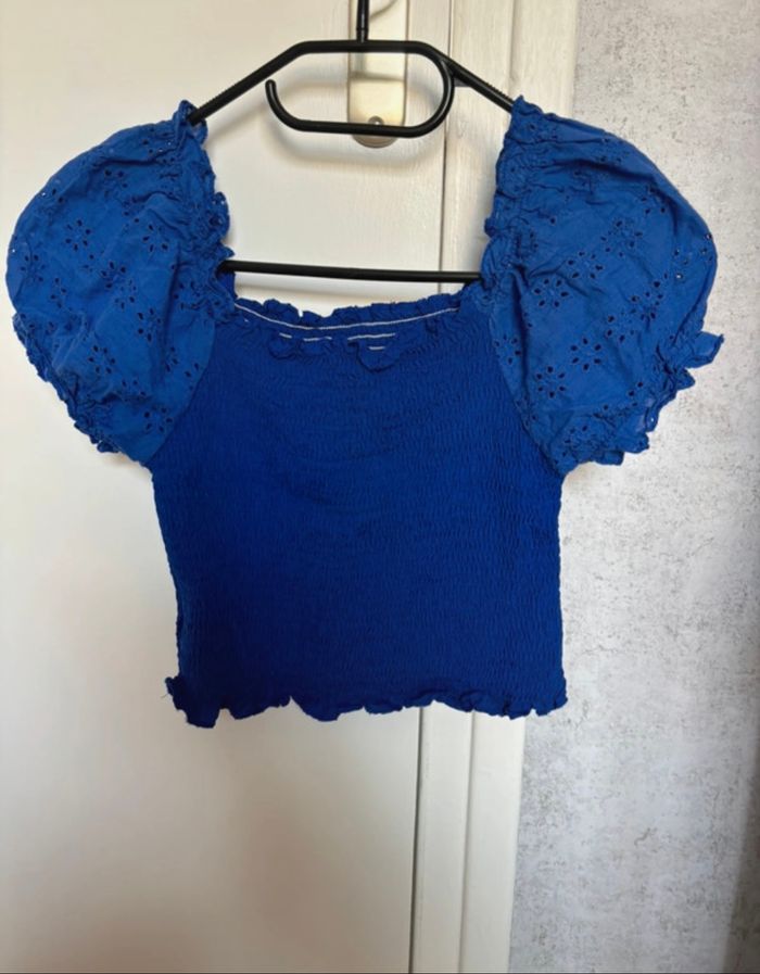 Blouse courte à plis
