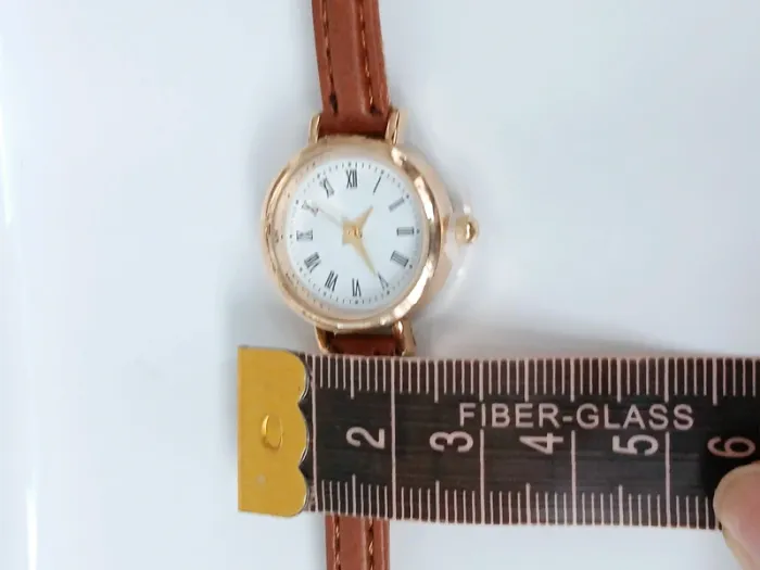 Montre vintage chic dorée bracelet marron à chiffres romains Neuf - photo numéro 6