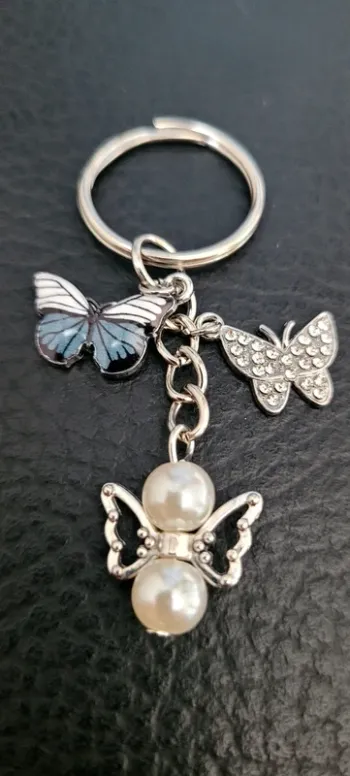 Porte-clés ange gardien papillons