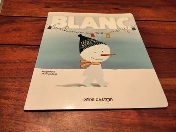 Livre intitulé blanc bonhomme de neige père castor