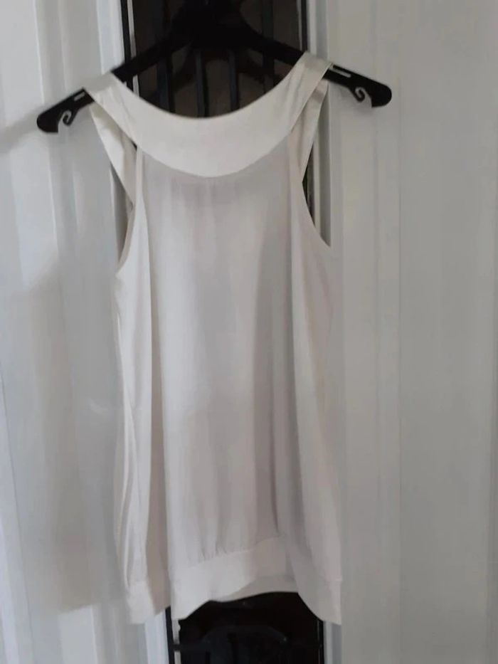 Top blouse blanc sans manches très bon état Taille 38/40 - photo numéro 3