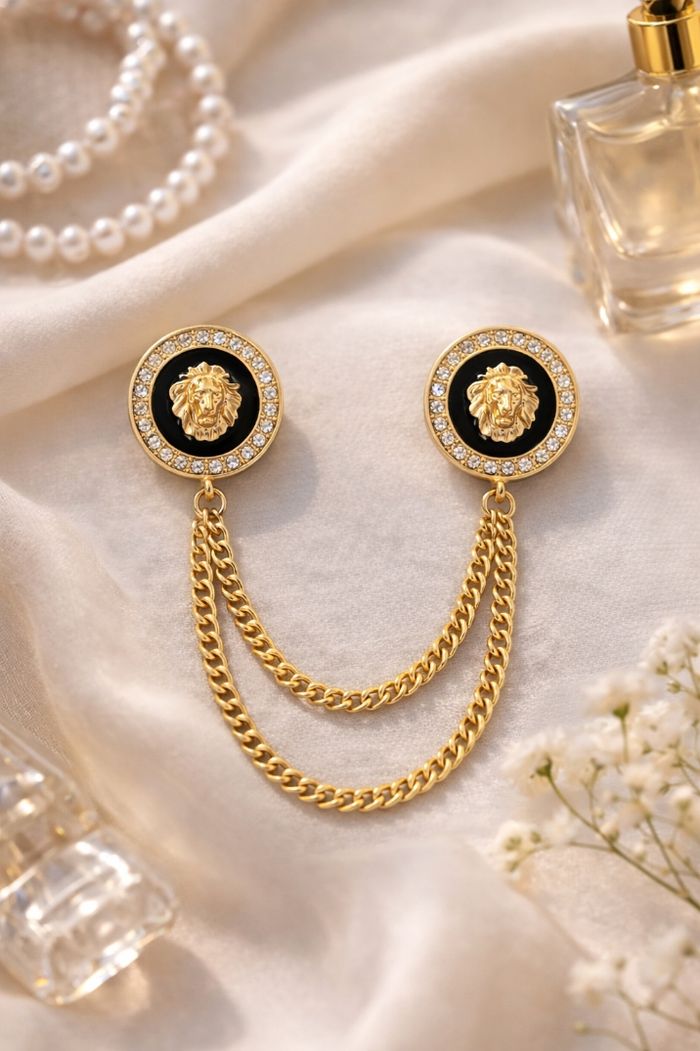 Broche double chaîne dorée tête de lion marque L Embroché 💎 - photo numéro 2