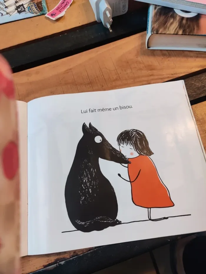 Une fillette, un loup un point c'est tout - photo numéro 3