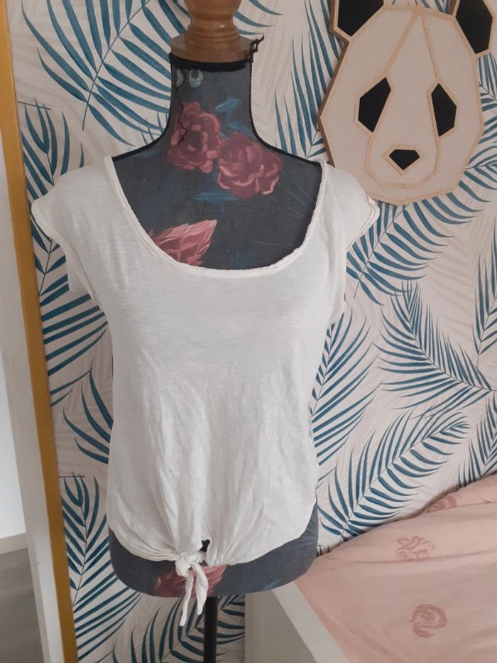 Tee-shirt sans manches dentelle dans le dos S